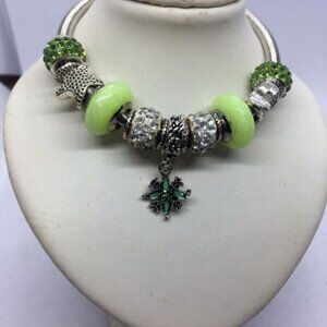 Silver Twist Bracelet with Green Glow in the Dark Beads and Crystal Flower Charm